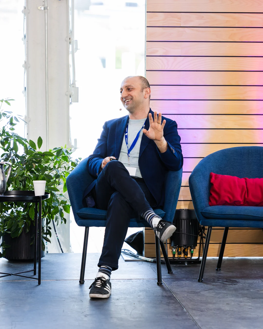 Jean Fahmy in conversation at an artificial intelligence conference